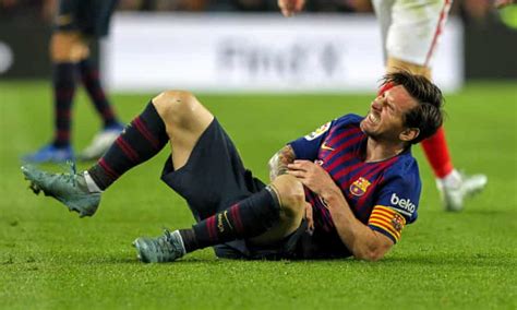 barcelona thump sevilla but fractured arm rules lionel messi out of