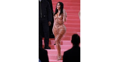 so camp kim kardashian redefining her sex appeal in a dripping dress