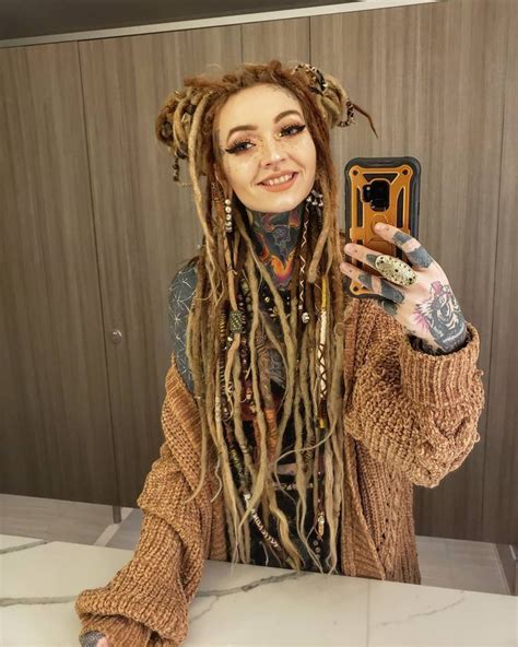 image may contain 1 person white girl dreads rasta girl dreads girl