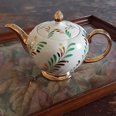 vintage ellgreave english teapot full size  cup hand painted green gold leaves gold gild