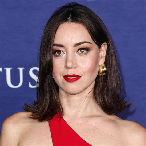 aubrey plaza stuns in a mini skirt and sheer tights for the la times