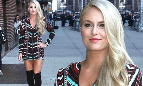 lindsey vonn struts it out in sexy boots and a very short dress in new