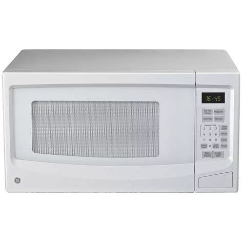 Ge 1 1 Cu Ft Countertop Microwave Oven In White The Home Depot Canada