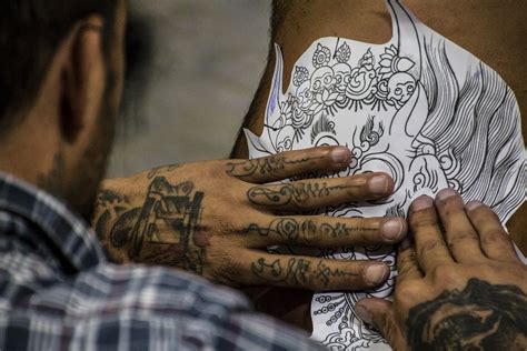 The Tattoo Artists Inking Domestic Abuse Survivors For Free