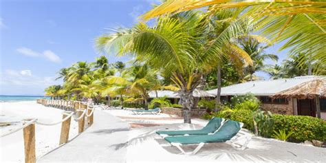 palm island beachfront cottages exterior   tropic breeze caribbean  maldives holiday blog