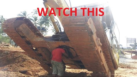 heavy equipment disasters crash excavator failwin  construction accidents caught  tape
