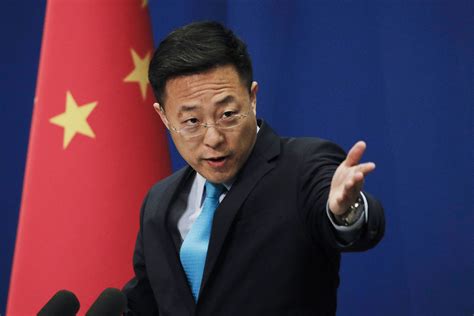 chinas diplomats show teeth  defending virus response aruba today