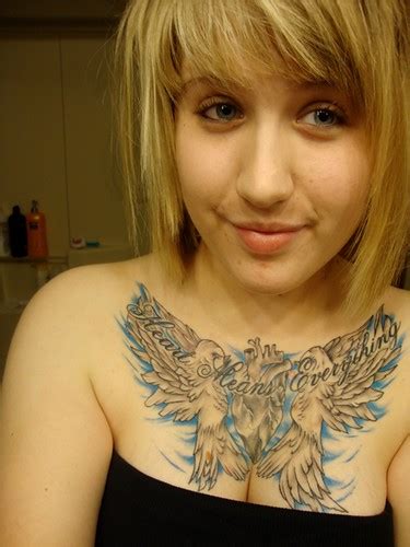 tattoo njembeng nice women smile with chest tattoos sexy