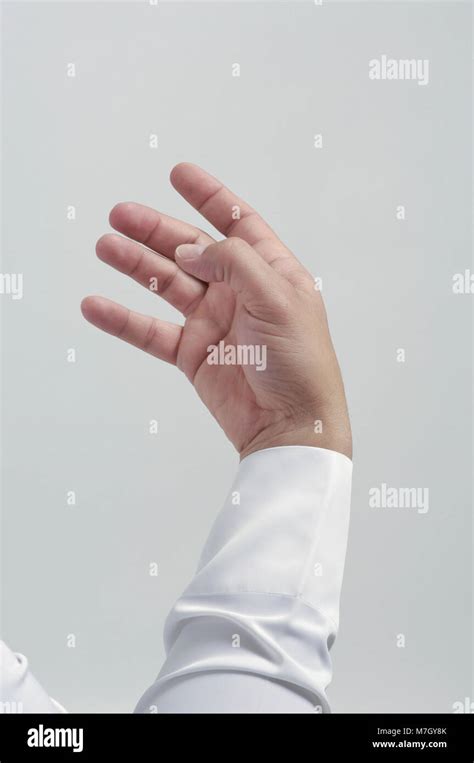 empty male hand  placing mobile phone   object isolated close  stock photo alamy