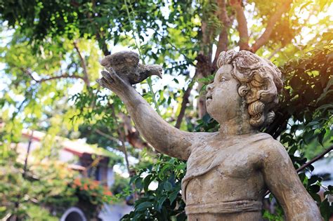 choose  perfect garden statues   outdoor oasis lovetoknow