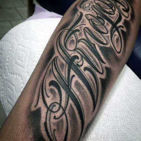 tattoo lettering designs  men manly inscribed ink ideas