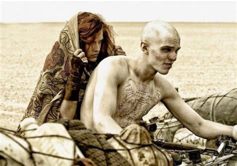 new mad max fury road photos highlight charlize theron
