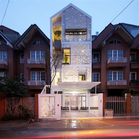landmak architecture transforms cocoon house  vietnam