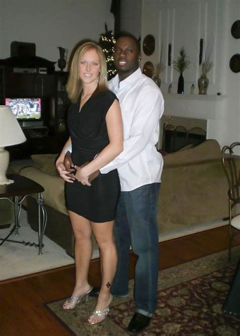 Interracial Couple In A Cozy Living Room