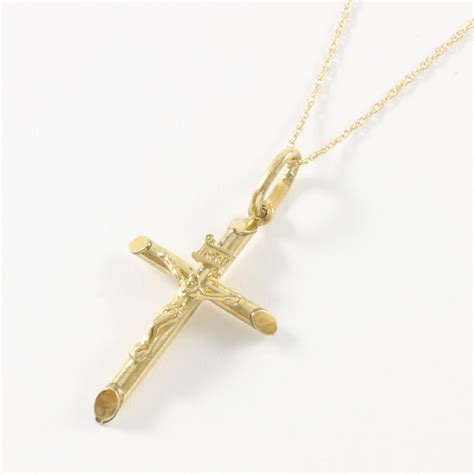 solid  yellow gold cross necklace property room