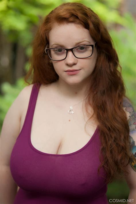 chubby redhead with big tits kaycee barnes looks adorable in her glasses as she gets nude