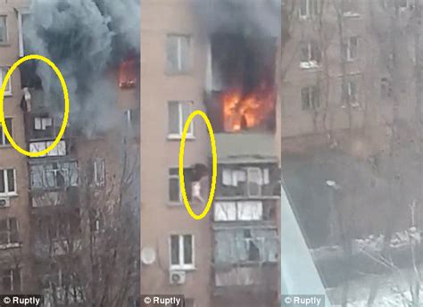 lady falls from an 8 storey building to escape a burning apartment watch video