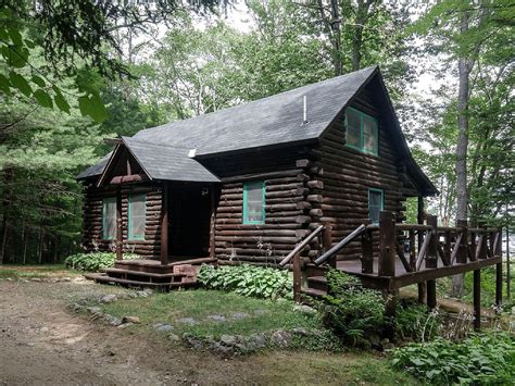 lakefront log cabin rental set  forestry  adirondack park  york   log cabin