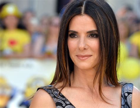 sandra bullock shows off ageless skin at the minions premiere glamour