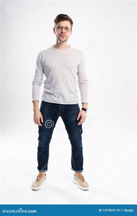 full body picture   smiling casual man standing  white background