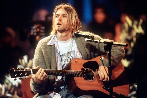 kurt cobains unplugged sweater sells  record   auction rolling stone