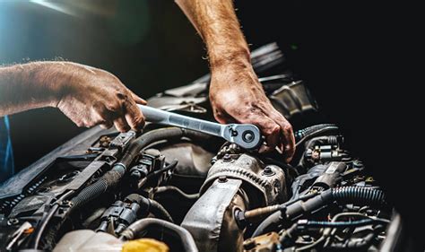 auto mechanic working  car engine  mechanics garage repair service