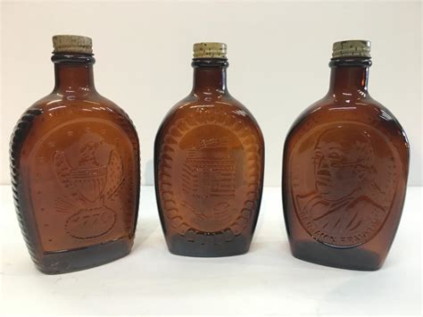 sold price log cabin syrup bicentennial  liberty amber glass bottles october