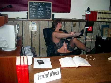 girl sitting on a chair november 2002 voyeur web hall of fame