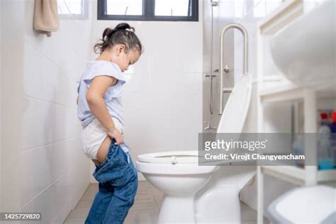 Girl Defecating Stockfotos En Beelden Getty Images