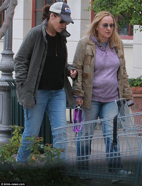 melissa etheridge and wife linda wallem walk arm in arm to the movies
