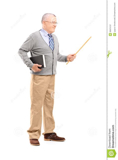 Full Length Portrait Of A Male Teacher Holding A Wand And A Book Stock