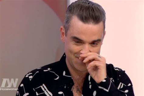 robbie williams wishes he was gay so he could have sex on tap as he admits he does have