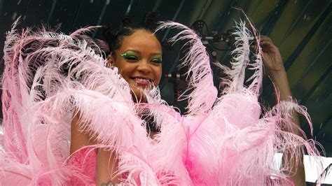 Rihanna Spotted In Massive Pink Feathers At Crop Over In
