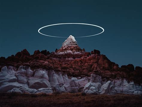 photographer reuben wu  drones  create halos  light  mountaintops booooooom
