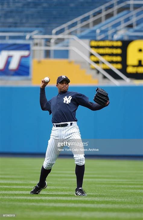 New York Yankees Pitcher Orlando Hernandez Warms Up On The Field At