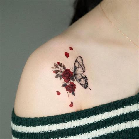 micro realistic  butterfly  roses tattoo
