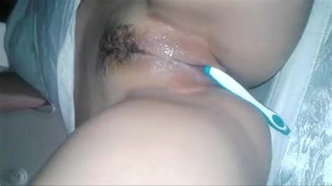 beautiful pussy masturbating using tooth brush and cums xnxx