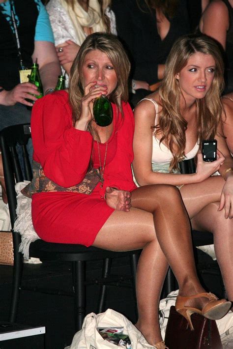 mature lady with pantyhose and crossed legs tan