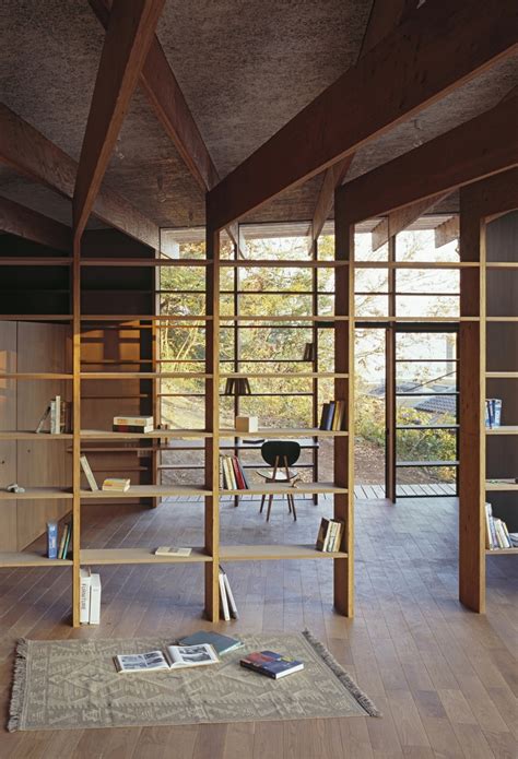 japanese residence with wood and glass geometry