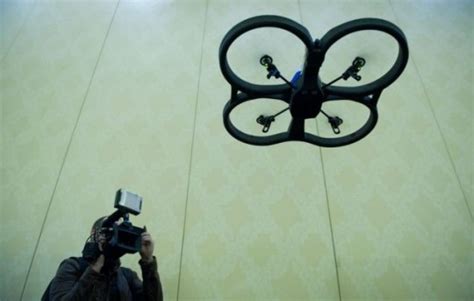 ces  parrot ar drone   controlled   smartphone   flies metro news