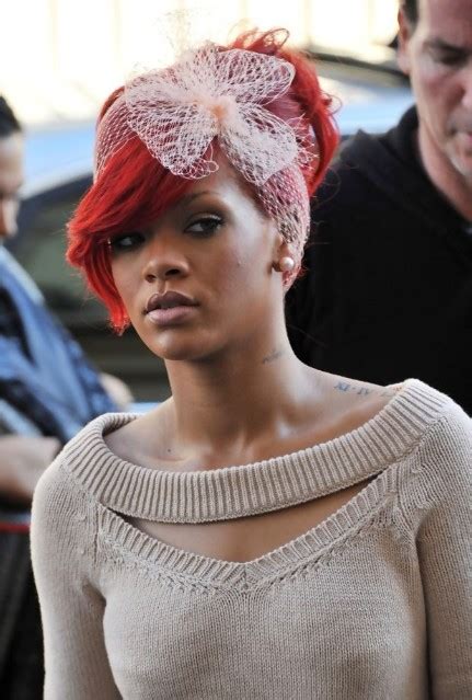 rihanna red updo with hair bow beautiful hairstyles