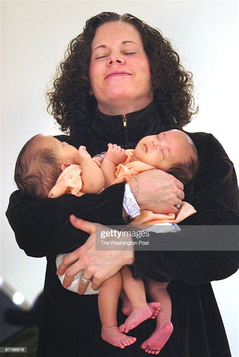Melissa Buckles Holds Conjoined Twins Jade And Erin Before A News