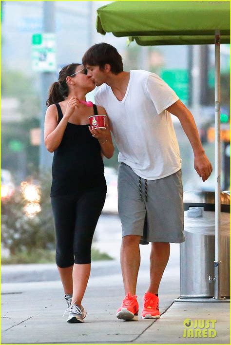 ashton kutcher plants a kiss on pregnant mila kunis after lunch photo