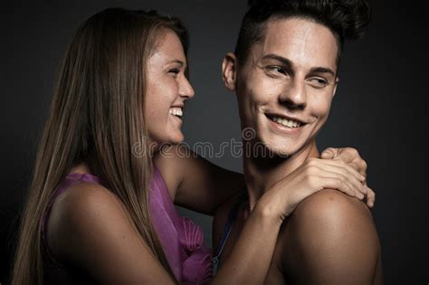 Sharing A Tender Moment A Loving Young Couple Standing Together