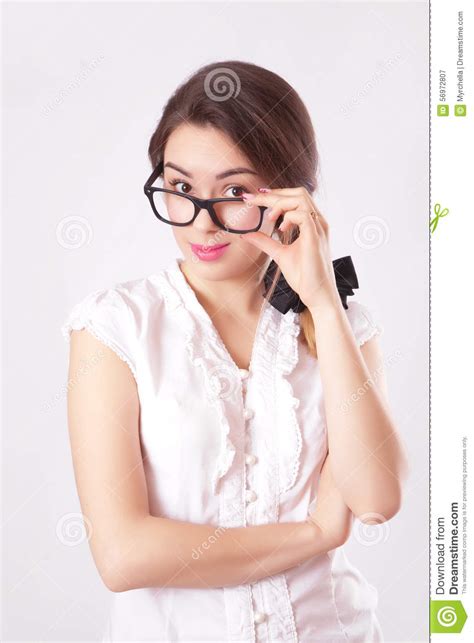 portrait of beautiful brunette woman in glasses stock
