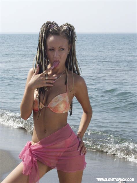 hot slut posing naked on the beach 3258