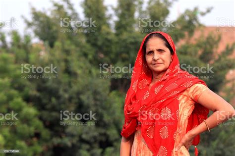 closeup portrait of mature indian women with side copy space stock