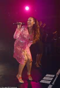 Leona Lewis In Pvc Raincoat As She Squirts Crowd With
