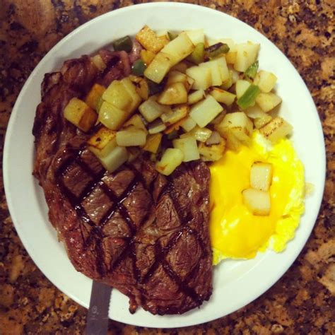 Ribeye Steak Scrambled Eggs With Cheese And Country Potatoes With