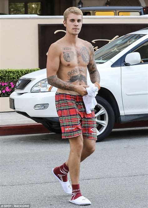 shirtless justin bieber enjoys a day out with laura lentz